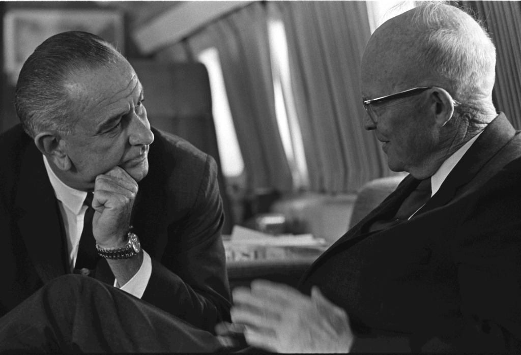 Former Republican president Dwight D. Eisenhower and Democrat President Lyndon Johnson on Air Force 1 in 1965.